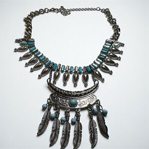 Naitive faux silver and turquoise necklace. Up to 18”drop.